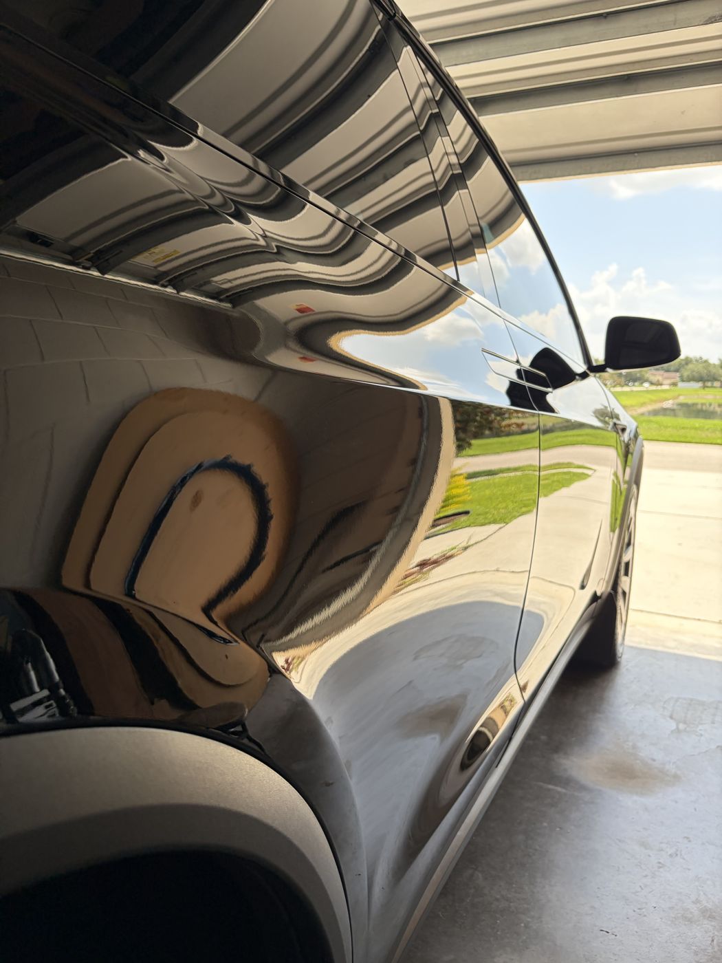 Tesla Model X paint correction by APES in Orlando